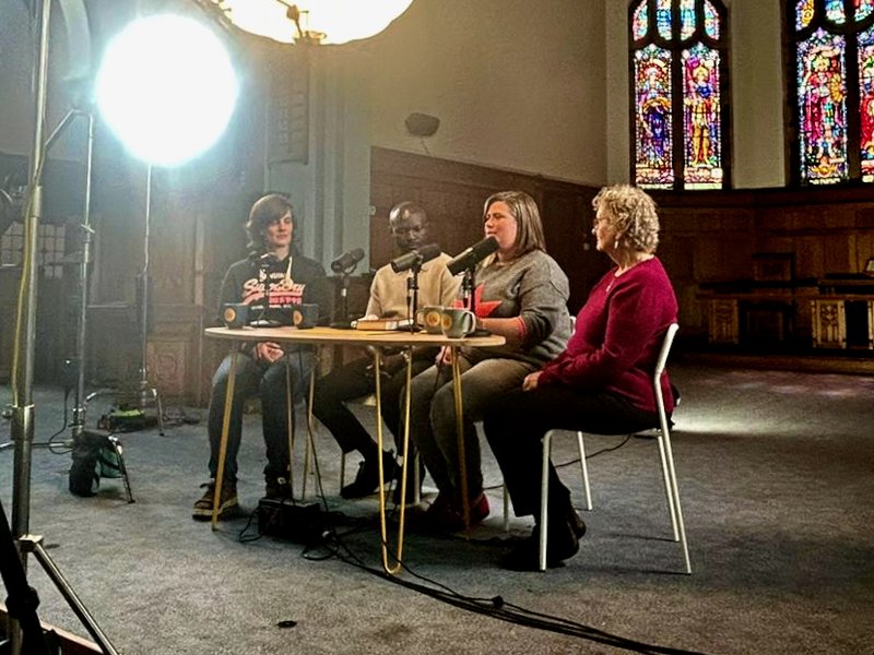 four people in a quiz show tv style