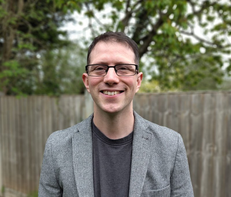 Headshot of Adam Sanders
