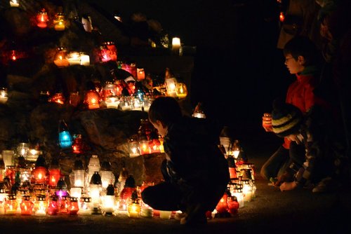 All Saints - Sanok, evening, November 1, 2013 (Photo by Silar, Creative Commons)