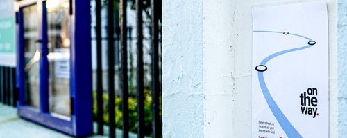 OnTheWay Poster on wall