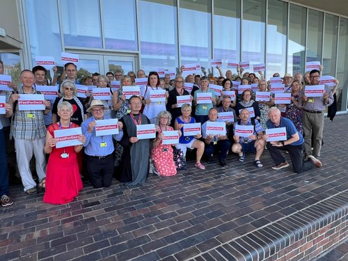 Members take part in a Fast for Gaza outside the Synod meeting hall