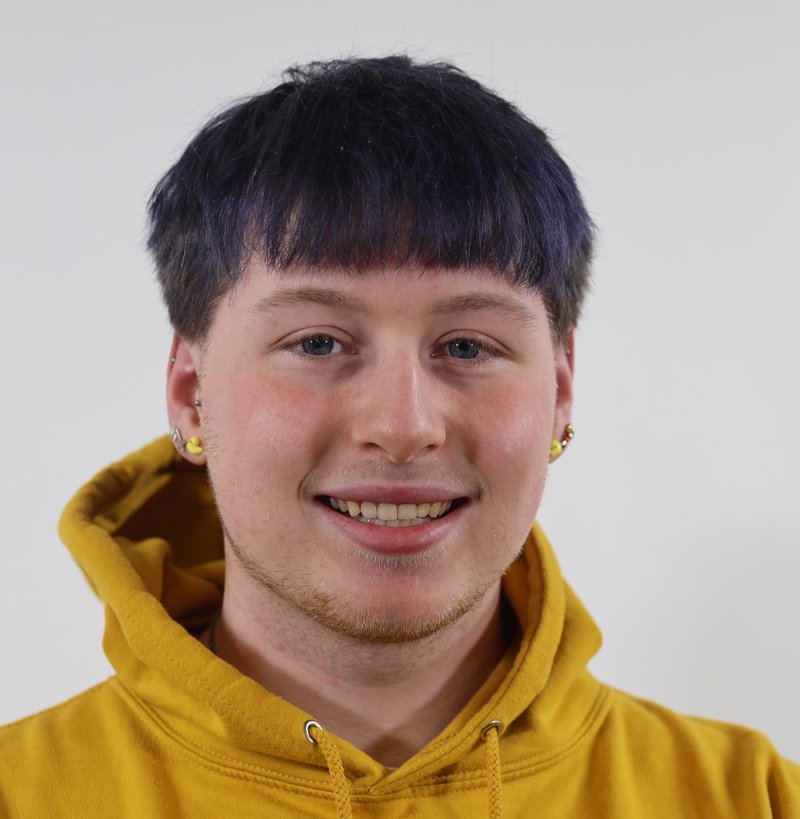 Photo of Genesis Padgett Youth President in a yellow hoodie