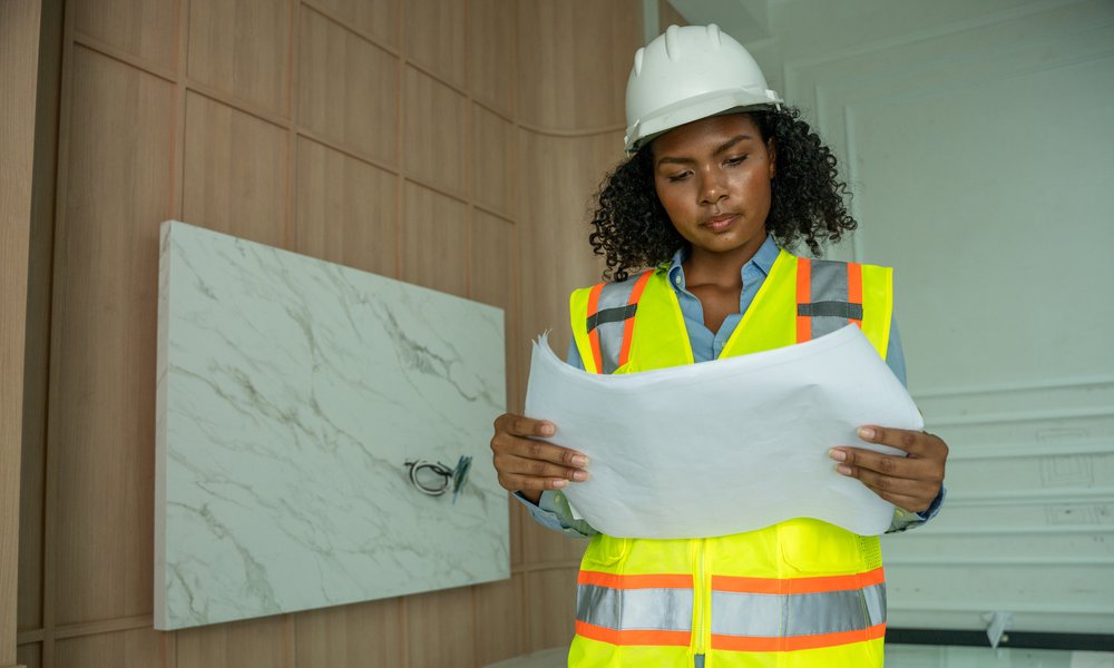 Woman writing on clipboard