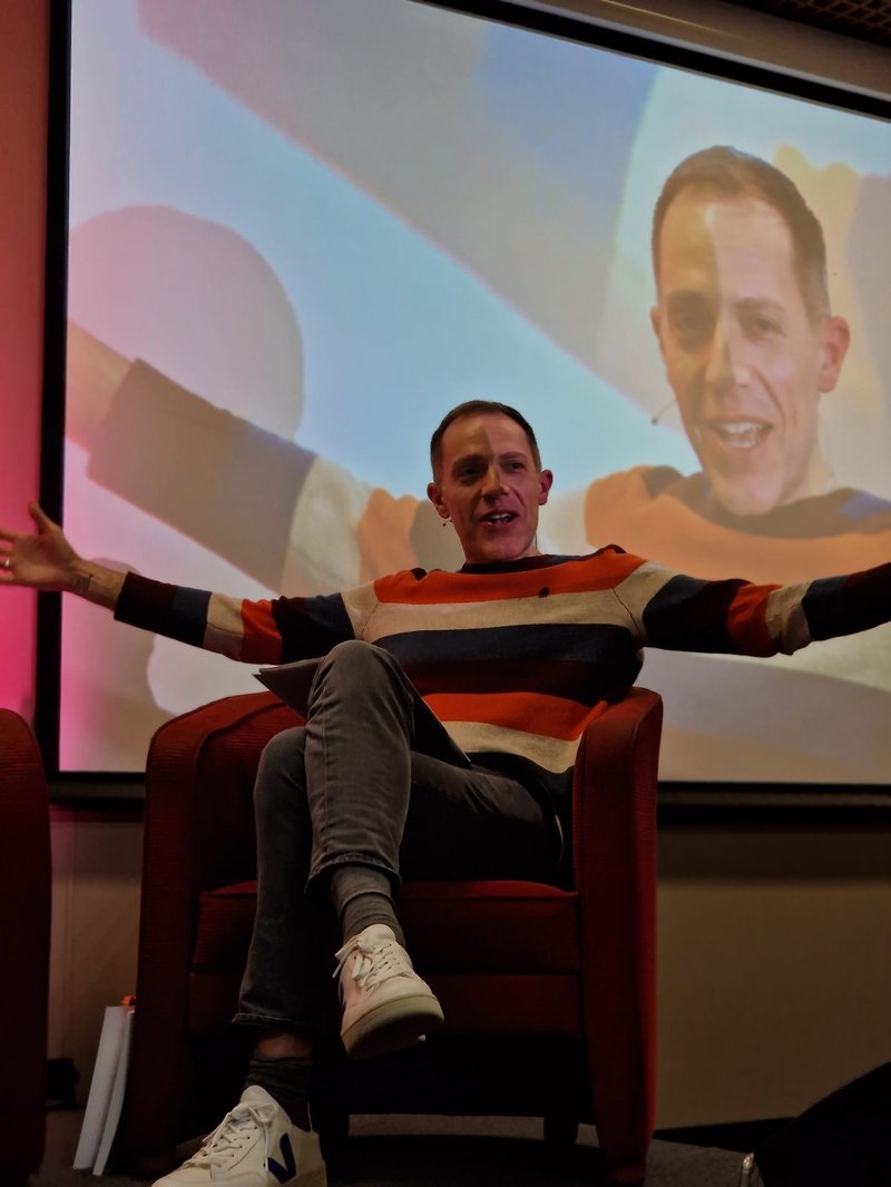 Revd Trey Hall sitting in a chair at Wholehearted