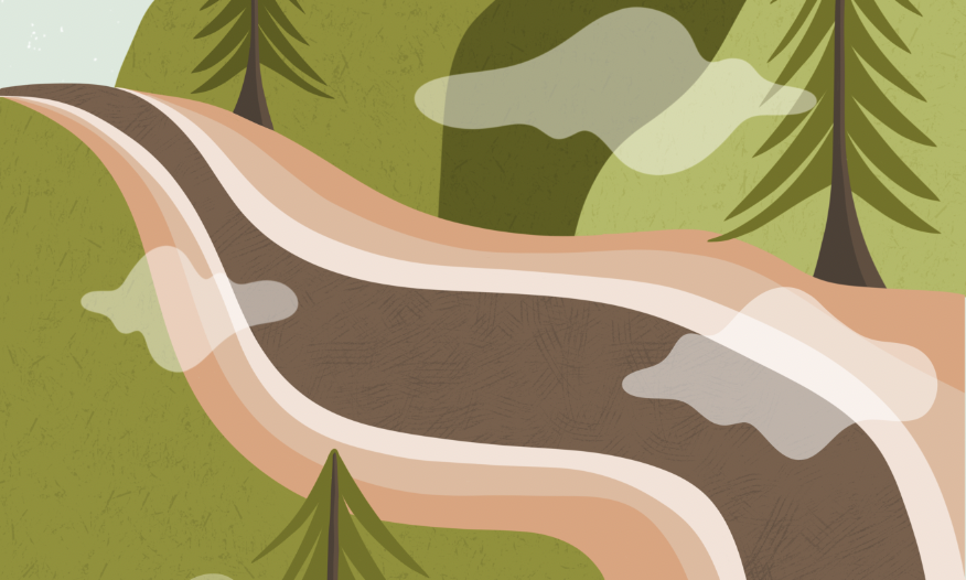 A roadway through a mountainous valley