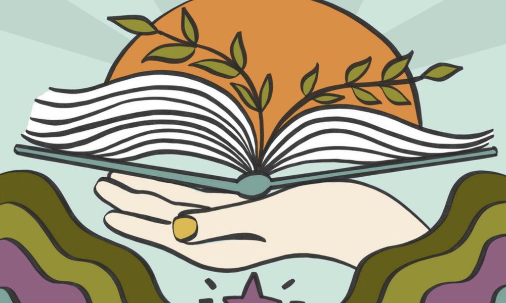 Hand holding a Bible