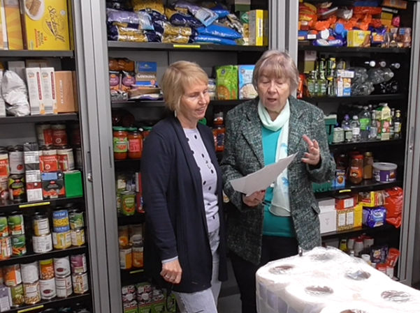 Two women at a foodbank