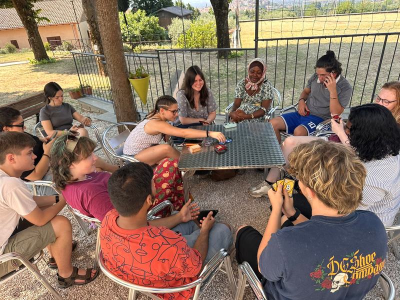 Playing Uno at Centro Ecumene