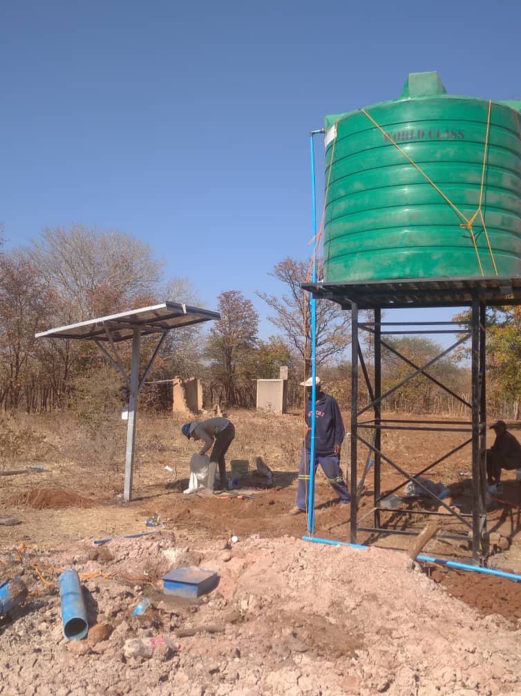 Green water tank with borehole and solar cells