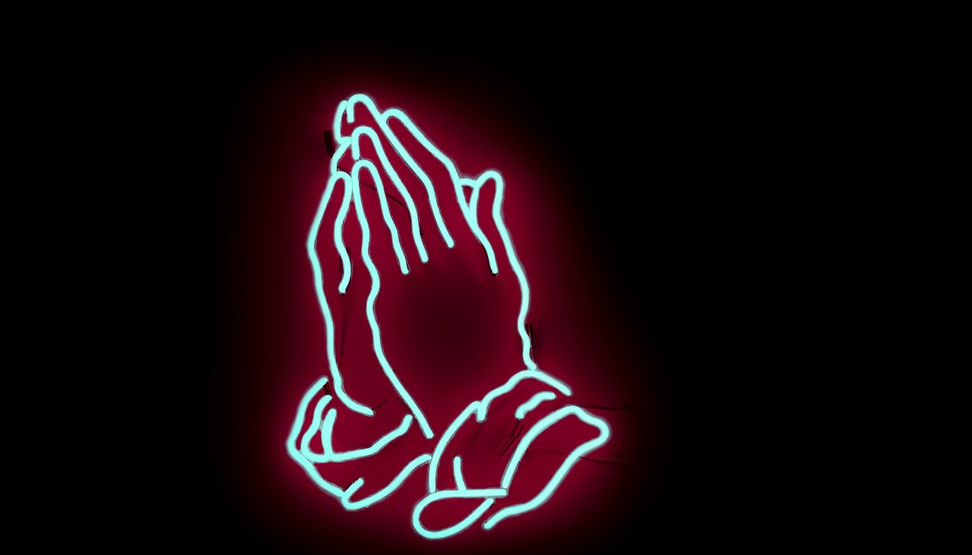Praying neon hands.