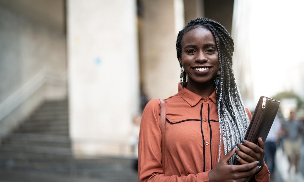 Female student smiles to camera
