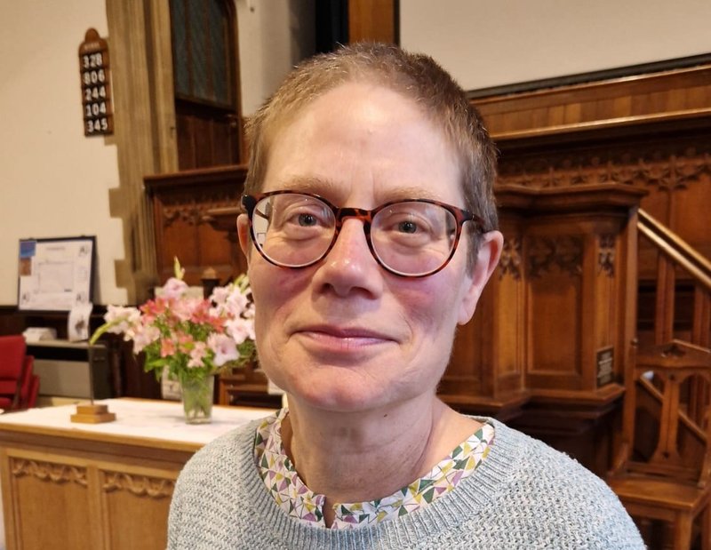A women standing in a church