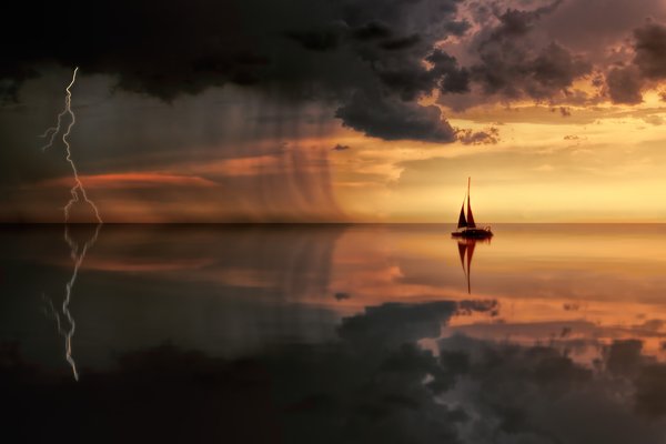 silhouette-photography-of-boat-on-water-during-sunset-1118874
