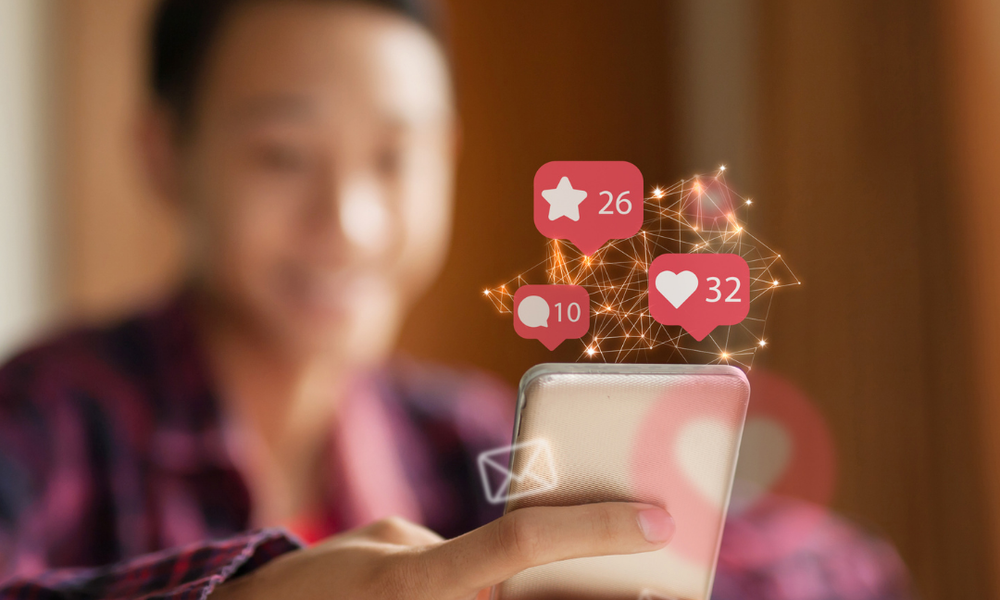 child looking at mobile phone