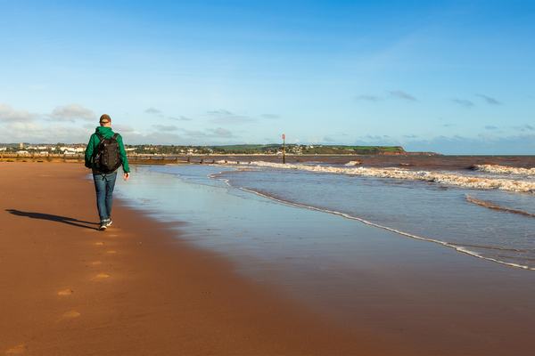 walking-by-waves-beach